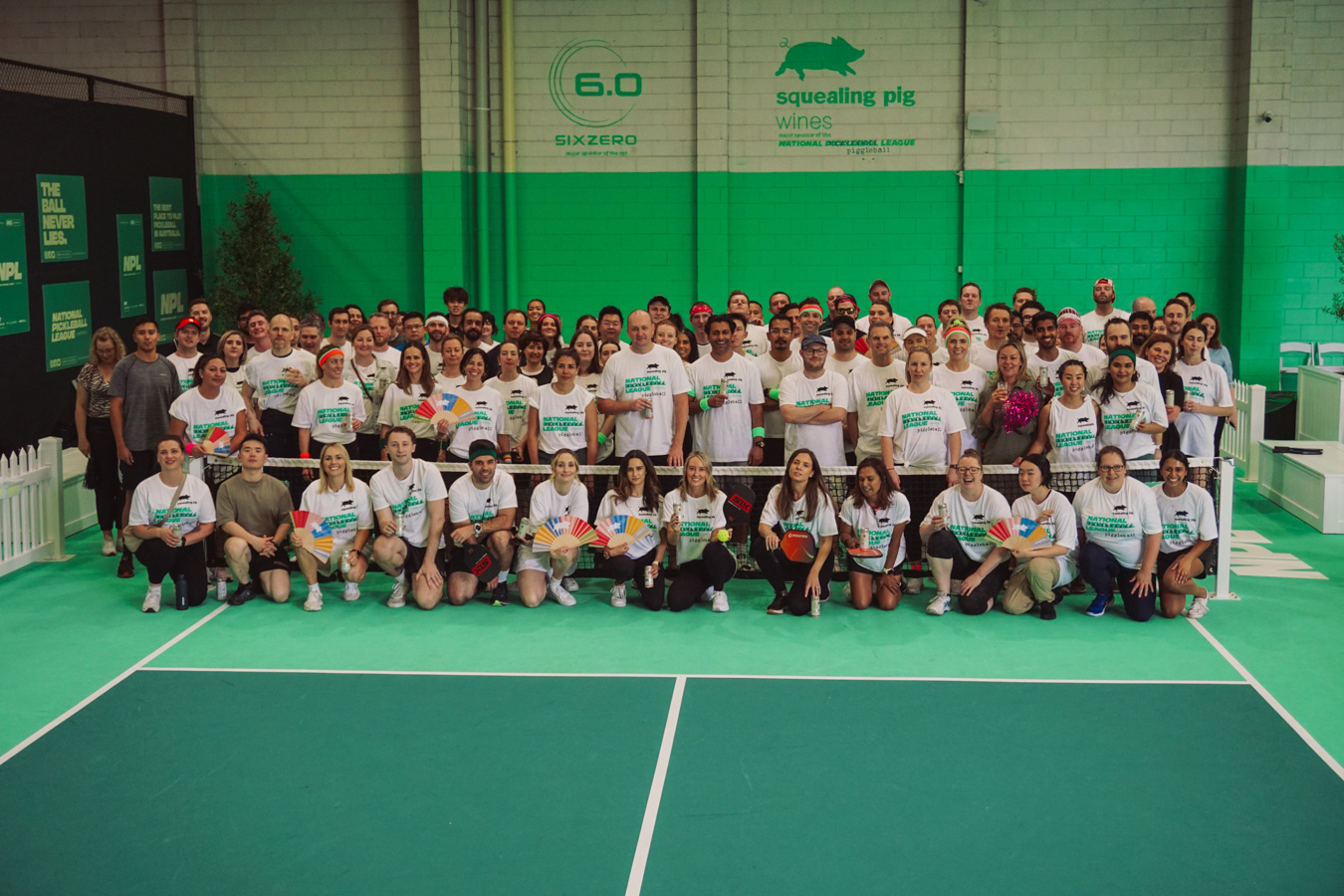 A large corporate group at a pickleball event at The Jar Club